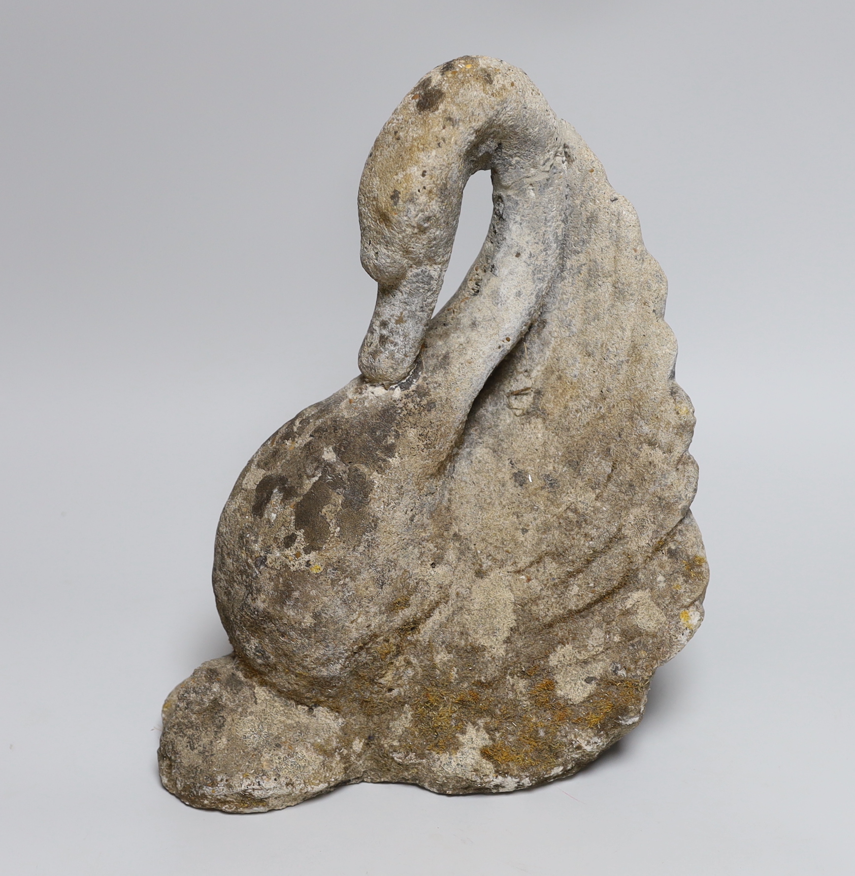 A reconstituted stone model of a swan, 30cm